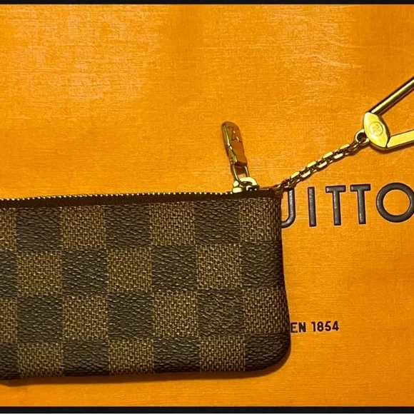 Authentic Damier Ebene Louis Vuitton Key Pouch. - Picture 1 of 10